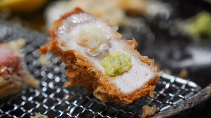 fried pork with vegetables and wasabi