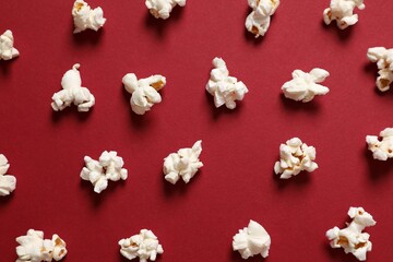 Delicious popcorn on a colored background