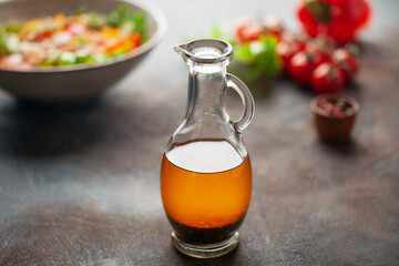 Italian vinaigrette sauce in bottle for sauces. Homemade salad dressing
