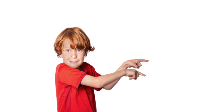 Little red-haired preschool child smiling at the camera and pointing at copy space, isolated on free png background.
