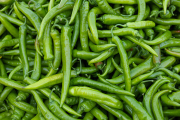 Many green and red hot chili peppers 