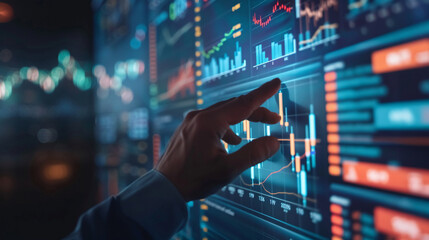 Fototapeta premium Businessman examining investment trends on a digital screen with financial analytics and data insights