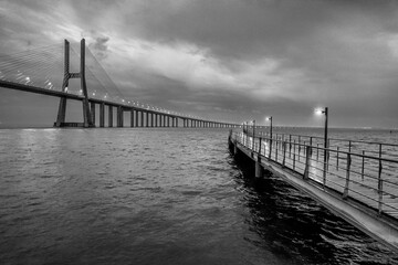 Rainy night image of the Vasco da Gama bridge from the Parque das Nações in Lisbon.