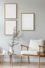 Modern minimalist interior with empty blank frames, wooden chair, and table decor