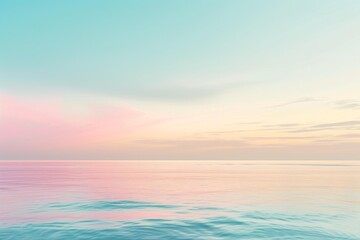 Fototapeta premium Calm seascape with soft pastel colors of sunrise over the ocean horizon