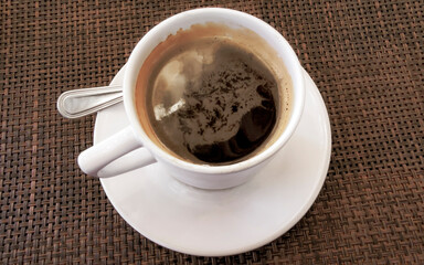 Cup of americano black coffee in restaurant cafe in Mexico.