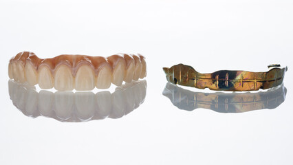 upper jaw prosthesis made of zircon and titanium bar on a white background