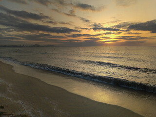 Sunset on the beach of Urbanova, province of Alicante in the Valencian Community in Spain.