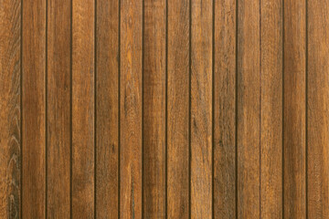 Background is made of wooden slats with a brown texture of natural wood.