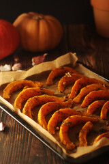A tray with baked pumpkin in autumn style