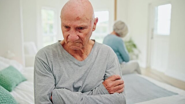 Senior couple, divorce and breakup on bed in conflict, disagreement or fight at home. Frustrated elderly man in cheating affair, divorce or disappointment in bedroom argument or toxic relationship