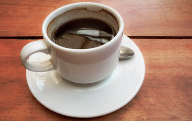 Cup of americano black coffee in restaurant cafe in Mexico.