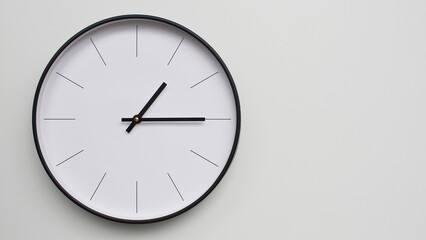 Wall Clock Showing 13.15/01.15 O'Clock on White Wooden Surface - Perfect for Time Management and Scheduling Concepts