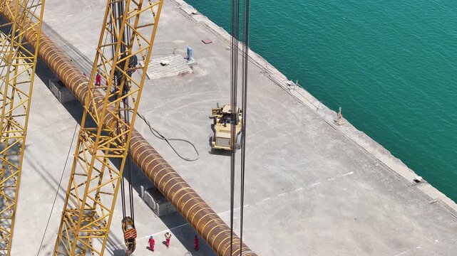 Operating large cranes and pipes on a deepwater rig