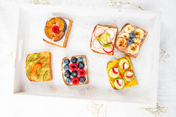 Colorful sandwiches with fruits and vegetables