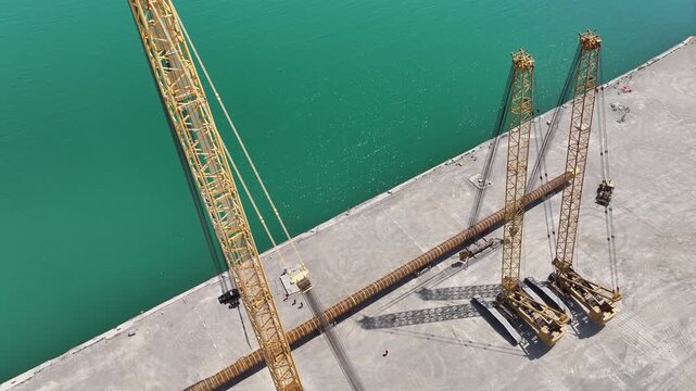 Operating large cranes and pipes on a deepwater rig