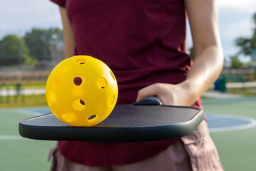 Woman playing Pickleball