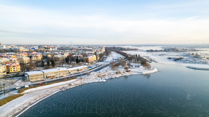 drone aerial photo of city of Helsinki Finland on a snowy cold day