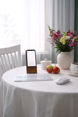 A beautifully elegant home workspace adorned with fresh fruits and lovely flowers for inspiration