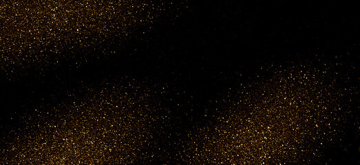 Golden glitter sparkling light texture background. Starry night sky. Galaxy space. Glowing stars. New Year, Christmas and Celebration background concept.