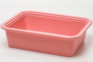 Rectangular Plastic Container in Soft Peach Color on Neutral Background for Storage Use