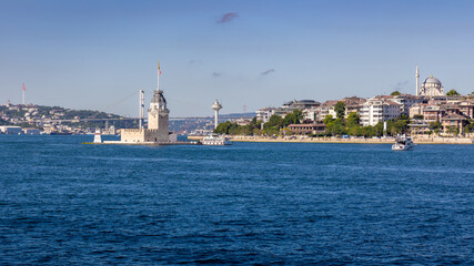Fototapeta premium Asian district of Istanbul Bosphorus Maiden Tower bridge mosque at sunny day, Istanbul, Turkey