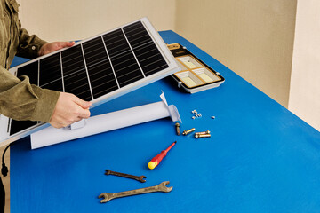 Use of solar energy in street lighting, installation of an autonomous, wireless LED lamp on...