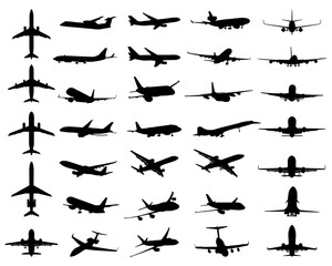 Black silhouettes of different aeroplanes on a white background