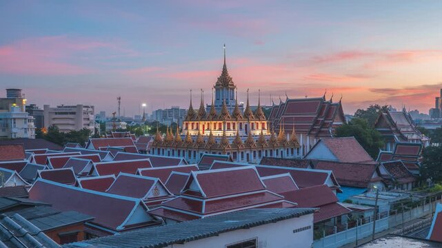 The majestic Loha Prasat temple, taken at dawn in Bangkok, Thailand - Timelapse night to day transition - 4k