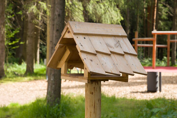 Bird feeder in the park. Feeding birds in the park.
