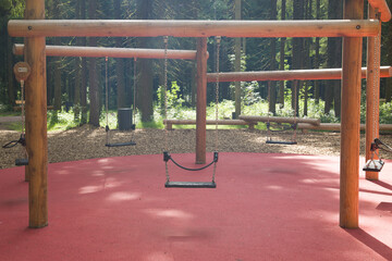 Children's swing in a modern park without children.