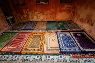 Muslim prayer carpets of various colors near the mosque in Dhaka Bangladesh