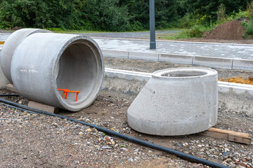 Components for a concrete road channel.