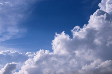 White fluffy cloud on a sky-blue vault. Abstraction. Copy space