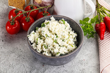 Curd cheese with green herbs
