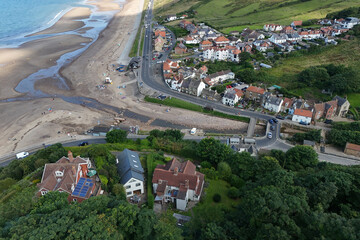 Fototapeta premium aerial view of Sandsend a small fishing village north of Whitby North yorkshire heritage coast, a UNESCO World Heritage Site