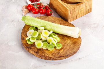 Ripe sliced leek over board