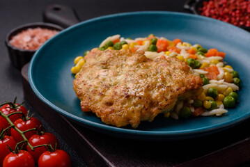 Delicious boiled rice with vegetables or risotto with carrots, peas and corn