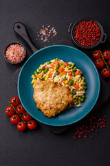 Delicious boiled rice with vegetables or risotto with carrots, peas and corn