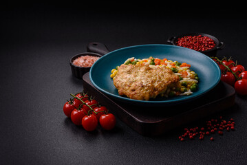 Delicious boiled rice with vegetables or risotto with carrots, peas and corn