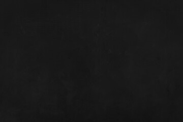 Old black grunge background. Dark concrete wallpaper