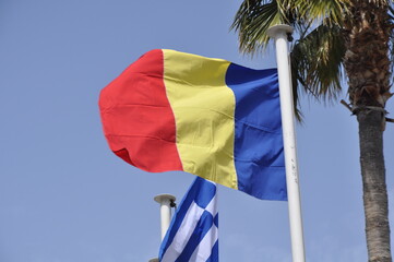 Greece and Romania flag on the flagpole