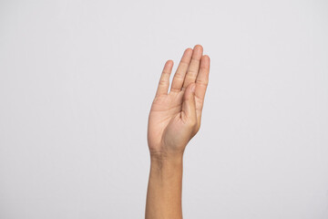 Deaf alphabet letter B by hand. Letter 'B' in sign language, isolated on a white background. Hand...
