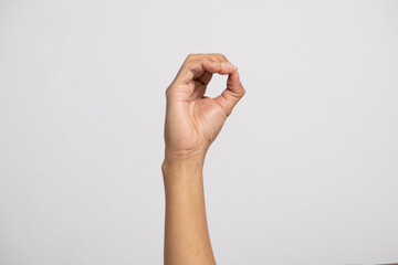 Deaf alphabet letter O by hand. Letter 'O' in sign language, isolated on a white background. Hand...