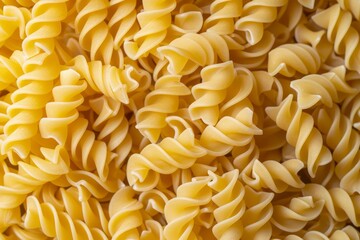 Detailed image showcasing the curly shape of dry fusilli pasta, perfect for culinary backgrounds