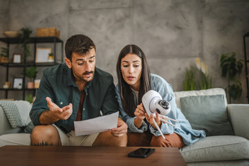 couple read instruction how to connect with cctv security camera