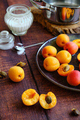 yellow ripe apricots on a plate