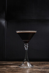 low key espresso martini with black leather background
