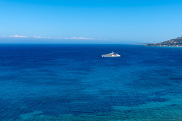 A big white yacht moored on the Ioanian sea, Greece.