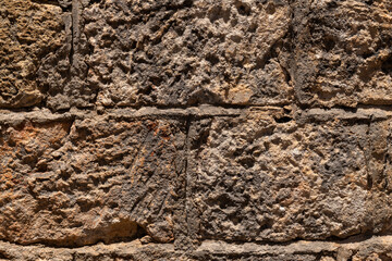 Ancient Greek stone wall texture background.